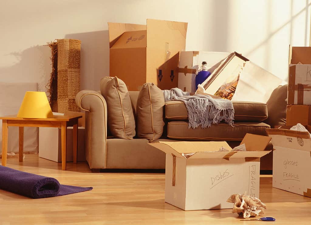boxes and partially packed furniture in a house