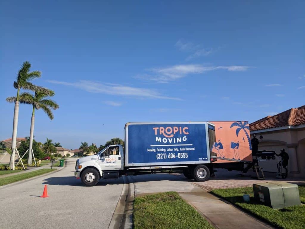 Tropic Moving Truck in Driveway