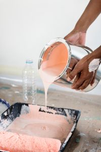 Pouring Paint Into Paint Tray