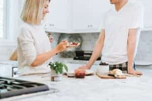 couple eating in kitchen