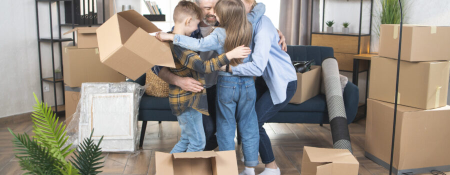 When to start packing for a move - family with moving boxes